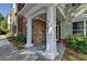 Charming entrance with brick accents and a welcoming doorway at 1965 Nocturne Dr # 1205A, Alpharetta, GA 30009