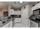 Efficient kitchen with stainless steel appliances and modern cabinetry at 1965 Nocturne Dr # 1205A, Alpharetta, GA 30009