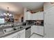 Bright kitchen with great flow into the living area at 1965 Nocturne Dr # 1205A, Alpharetta, GA 30009