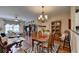Inviting living room with wood floors, ceiling fan, and comfortable seating arrangement at 1965 Nocturne Dr # 1205A, Alpharetta, GA 30009