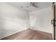 This bedroom is bright and spacious, with a window, closet, and ceiling fan at 327 Thornton Sw St, Atlanta, GA 30315