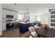 Eat-in kitchen featuring white cabinets, stainless steel appliances, and a granite island at 327 Thornton Sw St, Atlanta, GA 30315