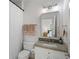 Neat bathroom showcasing neutral countertops, a white vanity, and a shower with a chevron curtain at 110 Mattison Cv, Atlanta, GA 30319