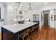 Kitchen featuring marble countertops, a large island, and stainless steel appliances at 110 Mattison Cv, Atlanta, GA 30319