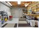 Unfinished basement with exposed ceilings, concrete walls, and storage shelves at 110 Mattison Cv, Atlanta, GA 30319