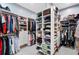 Spacious walk-in closet with custom shelving, shoe racks, and hanging space at 110 Mattison Cv, Atlanta, GA 30319