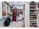 Organized walk-in closet with shelving, hanging rods, and storage solutions at 110 Mattison Cv, Atlanta, GA 30319