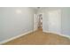 Cozy bedroom featuring neutral walls, plush carpeting, and ample closet space at 217 Chad Ln, Loganville, GA 30052