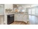 Modern kitchen with stainless steel dishwasher and ample counter space at 217 Chad Ln, Loganville, GA 30052