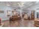 Spacious living room features hardwood floors, tray ceilings, and plenty of natural light at 217 Chad Ln, Loganville, GA 30052