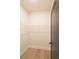 Empty walk-in closet with wire shelving and light hardwood floors at 2475 Adair Ridge Ct, Decatur, GA 30034