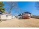 Large backyard featuring a shed, gazebo, and a well-maintained lawn at 557 Bradford Park, Loganville, GA 30052