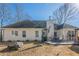 Patio area of backyard includes a grill and furniture, perfect for entertaining at 557 Bradford Park, Loganville, GA 30052