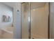 Bright bathroom with a separate soaking tub and walk-in shower at 557 Bradford Park, Loganville, GA 30052