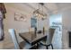 Elegant dining room featuring stylish seating and contemporary lighting at 557 Bradford Park, Loganville, GA 30052