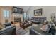 Cozy living room featuring a fireplace, comfortable seating, and stylish decor at 557 Bradford Park, Loganville, GA 30052