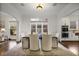 Bright dining room with neutral colors, hardwood floors, and arched entryway at 610 Timm Valley Ne Rd # B, Atlanta, GA 30305