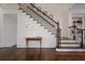 Classic staircase with hardwood steps, elegant iron railings and detailed trim work at 610 Timm Valley Ne Rd # B, Atlanta, GA 30305