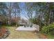 Backyard featuring a deck with outdoor seating and a private, wooded view at 2120 Mckinley Nw Rd, Atlanta, GA 30318