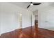 Bedroom with wood floors and multiple entryways at 4566 Town Manor Dr, Douglasville, GA 30135