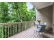 Cozy covered balcony with seating surrounded by lush greenery at 938 Canterbury Ln, Atlanta, GA 30324