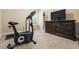 Home gym with exercise bike, dresser, and lots of natural light at 938 Canterbury Ln, Atlanta, GA 30324