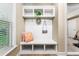 Mudroom boasts a built-in bench, storage and natural light at 938 Canterbury Ln, Atlanta, GA 30324