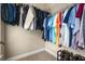 Organized walk-in closet with shelving and hanging rods for ample storage at 938 Canterbury Ln, Atlanta, GA 30324