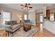 Bright living room with lots of natural light and hardwood floors at 1683 Wheatstone Dr, Grayson, GA 30017