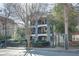 Charming three-story building with iron balconies and wrought iron fence adding to its appeal at 259 14Th Ne St # 104, Atlanta, GA 30309