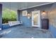 Cozy front porch features a swing, offering a relaxing spot to unwind and enjoy the outdoors at 259 14Th Ne St # 104, Atlanta, GA 30309