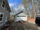 Detached one car garage next to a house with grey siding at 959 Grist Mill Dr, Acworth, GA 30101