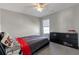 Bright bedroom featuring neutral walls, ceiling fan, and carpet flooring at 1348 Rolling Stream Way, Lawrenceville, GA 30043