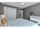 Bedroom with a large closet and neutral walls at 1348 Rolling Stream Way, Lawrenceville, GA 30043