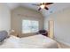 Bedroom with a vaulted ceiling, ceiling fan, and a comfortable chair at 1510 Mount Mckinley Dr, Grayson, GA 30017