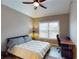 Bedroom featuring a ceiling fan and a large window at 1510 Mount Mckinley Dr, Grayson, GA 30017