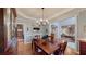 Formal dining room featuring hardwood floors, chandelier, and elegant trim detail at 1510 Mount Mckinley Dr, Grayson, GA 30017