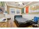 A cozy bedroom with a comfortable bed and a desk at 946 Highland Ne Vw, Atlanta, GA 30306