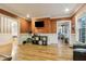 Spacious living room with hardwood floors, neutral color palette, and connection to other spaces at 946 Highland Ne Vw, Atlanta, GA 30306