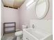 Unfinished bathroom with a pedestal sink, and minimalist decor at 549 Bishopton St, Grayson, GA 30017