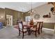 Dining area featuring a chandelier and wainscoting at 1070 River Valley Dr, Dacula, GA 30019