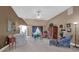 Inviting living room featuring vaulted ceiling, natural light, and neutral color palette at 1070 River Valley Dr, Dacula, GA 30019