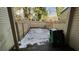 Enclosed backyard featuring a wooden fence, partially covered in snow, and a large plastic container at 497 Prince Of Wales, Stone Mountain, GA 30083