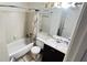 Standard bathroom featuring a vanity with a mirror and a shower-tub combination at 497 Prince Of Wales, Stone Mountain, GA 30083