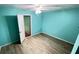 This bedroom features new floors and neutral paint at 497 Prince Of Wales, Stone Mountain, GA 30083