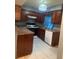 Functional kitchen featuring stainless steel appliances and dark cabinets at 497 Prince Of Wales, Stone Mountain, GA 30083