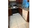 Functional kitchen featuring stainless steel appliances and dark cabinets at 497 Prince Of Wales, Stone Mountain, GA 30083