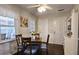 Cozy dining area with seating for four and lots of natural light at 744 Dean Way, Lawrenceville, GA 30044