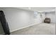 Spacious basement with carpet flooring, neutral paint, and natural light at 992 Yemassee Trl, Stone Mountain, GA 30083