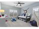 bedroom with a daybed, toy tent, table and chairs, and a ceiling fan at 2061 Westwood Cir, Smyrna, GA 30080